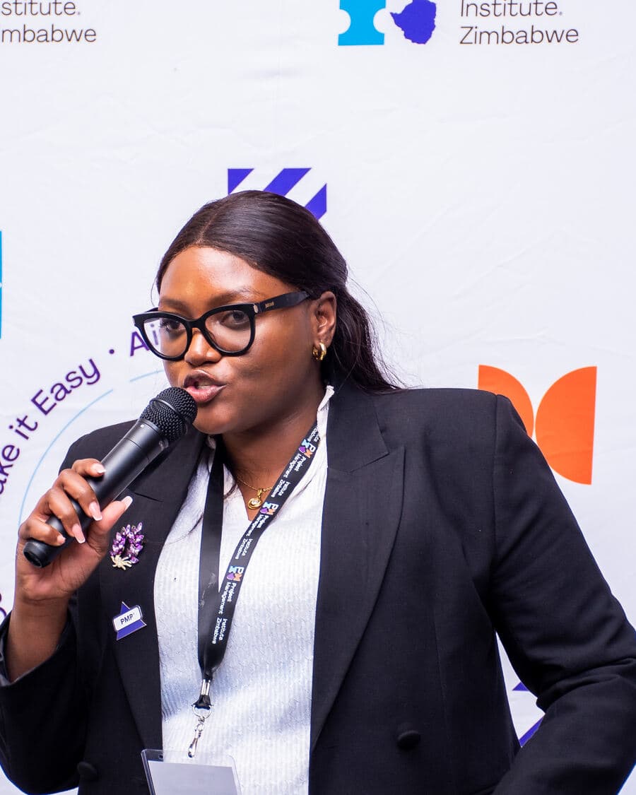Miriro Munodawafa at a PMI Zimbabwe podium