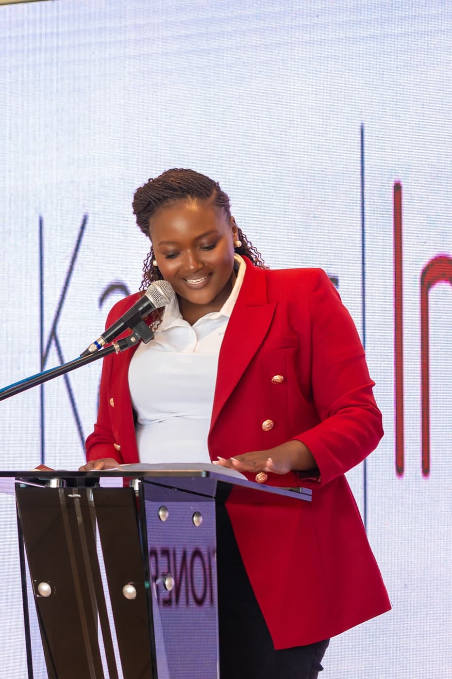 Miriro Munodawafa at a podium